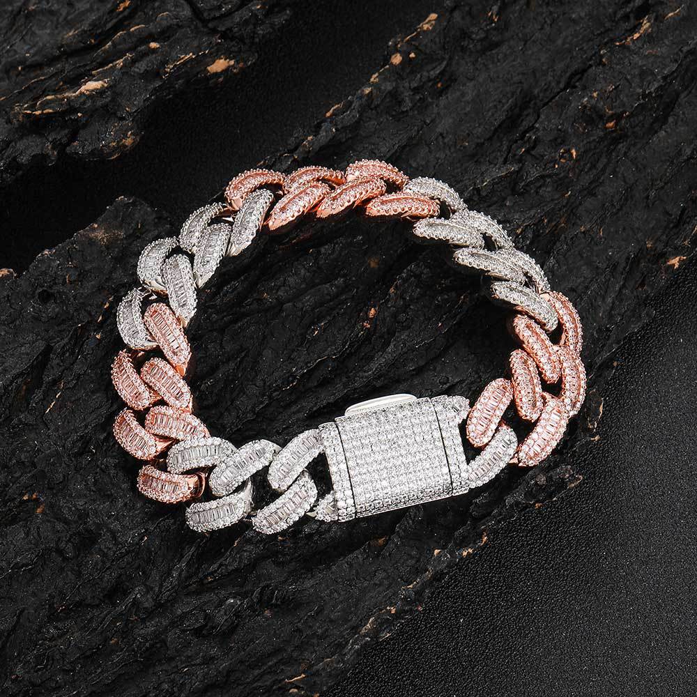 A chunky iced out cuban link bracelet. White and pink baguetee zirconias, iced out box clasp. Brass with rose gold and silver plating.