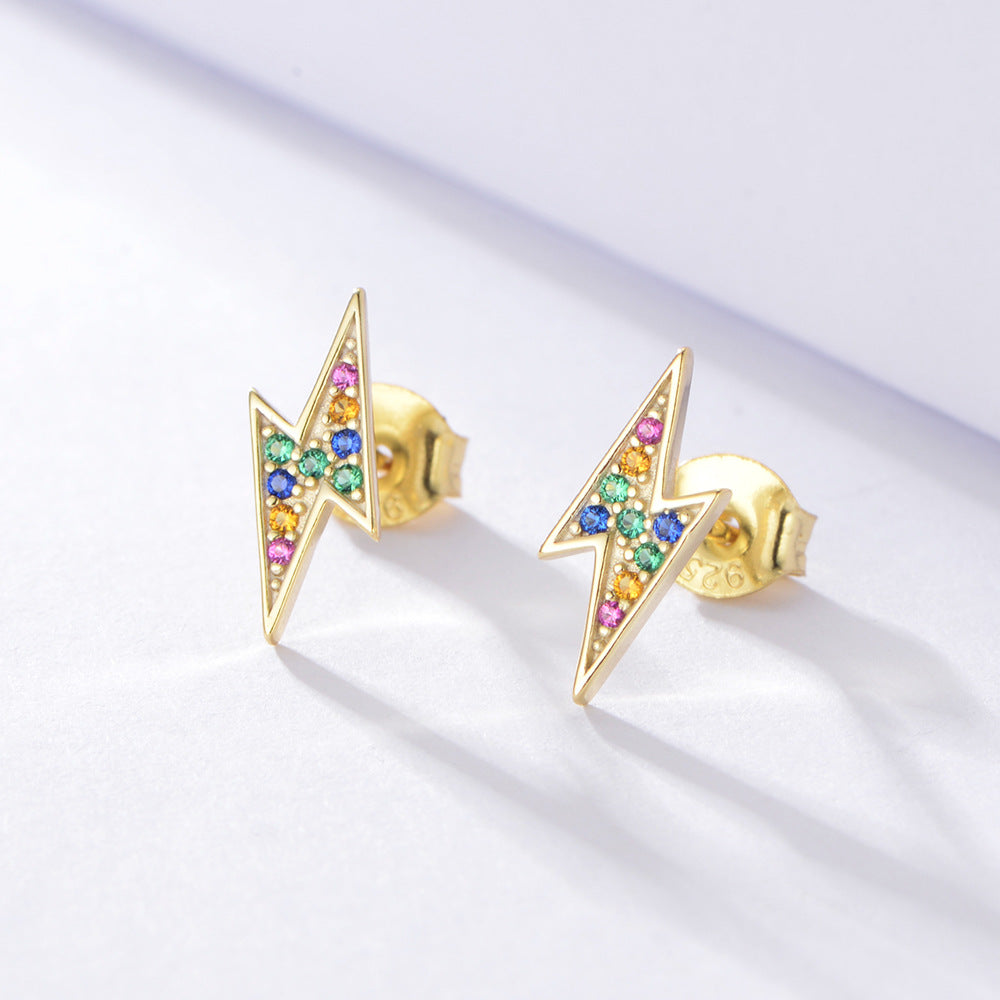 Sterling silver colored gemstone lightning stud earrings, inlaid with colorful zirconias. Plating with gold.