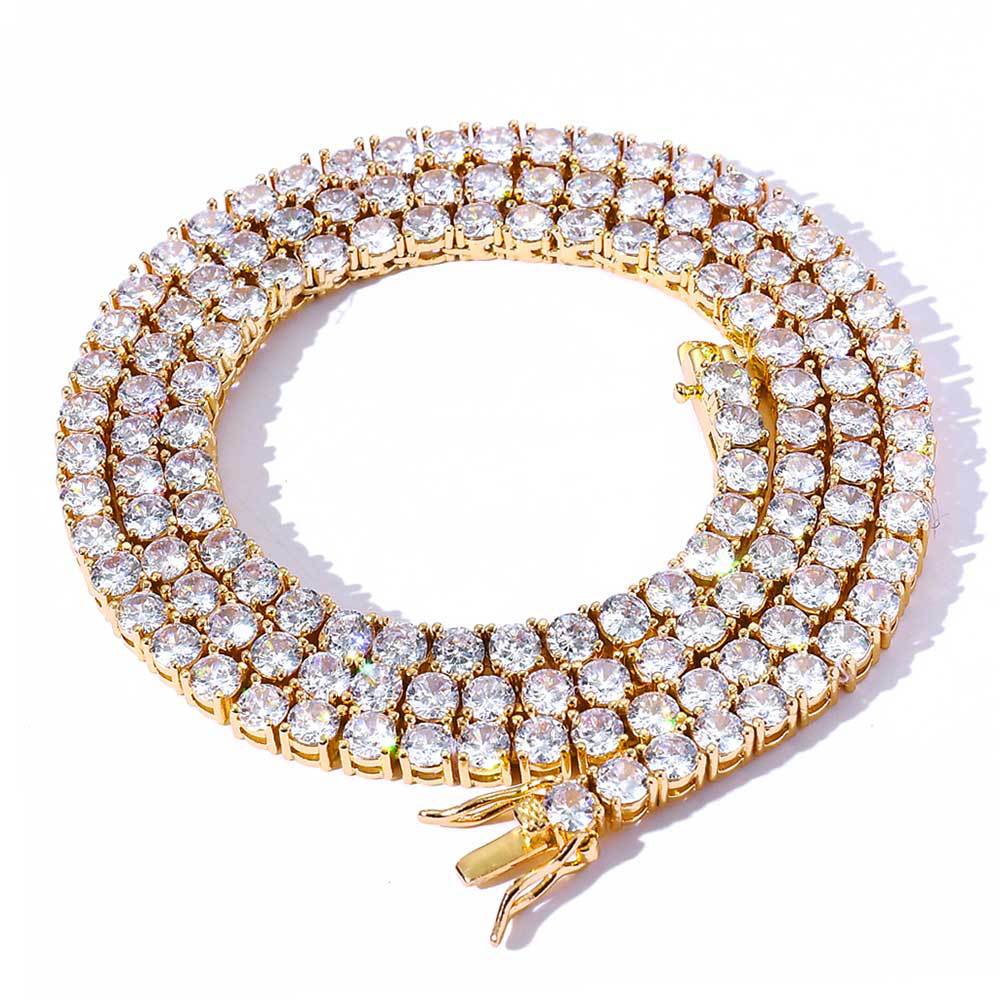 A cubic zirconia tennis chain necklace. Inlaid with white zirconias, brass with gold plating.