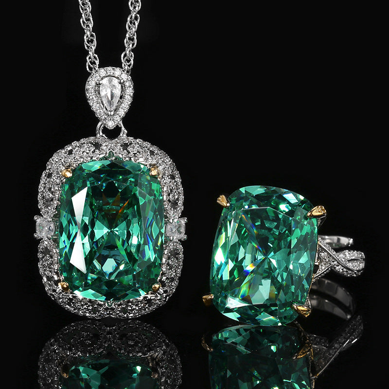 The emerald zirconia jewelry set, including necklace and ring, inlaid with a large green enmerald-cut zirconia.