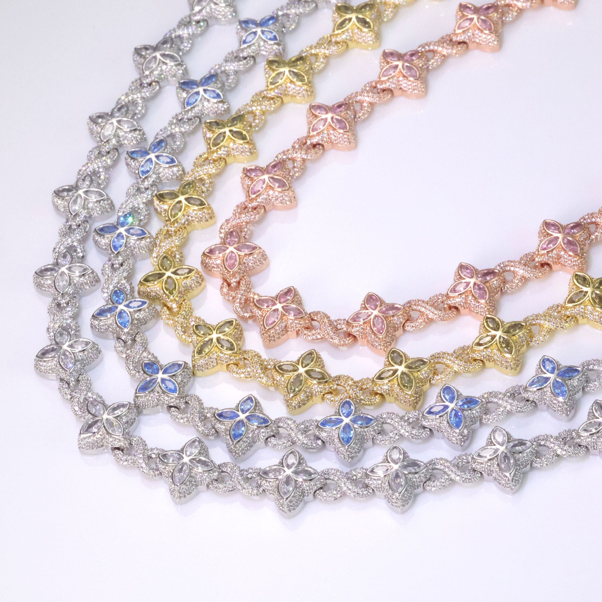 Close-up of the iced out luxury big clover necklace.