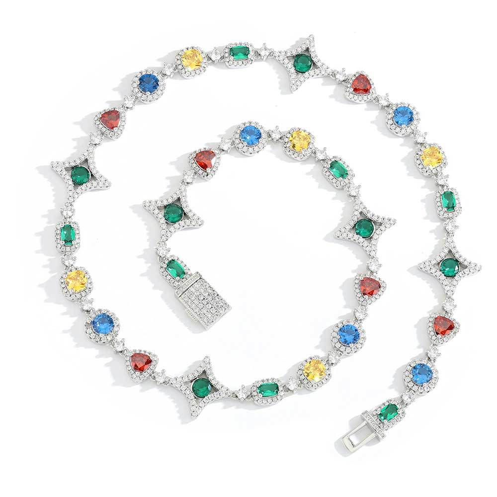 A silver plating brass necklace, pave halo motifs, main stones in color of emerald, topaz, citrine, garnet. North star motif. Iced out clasp.