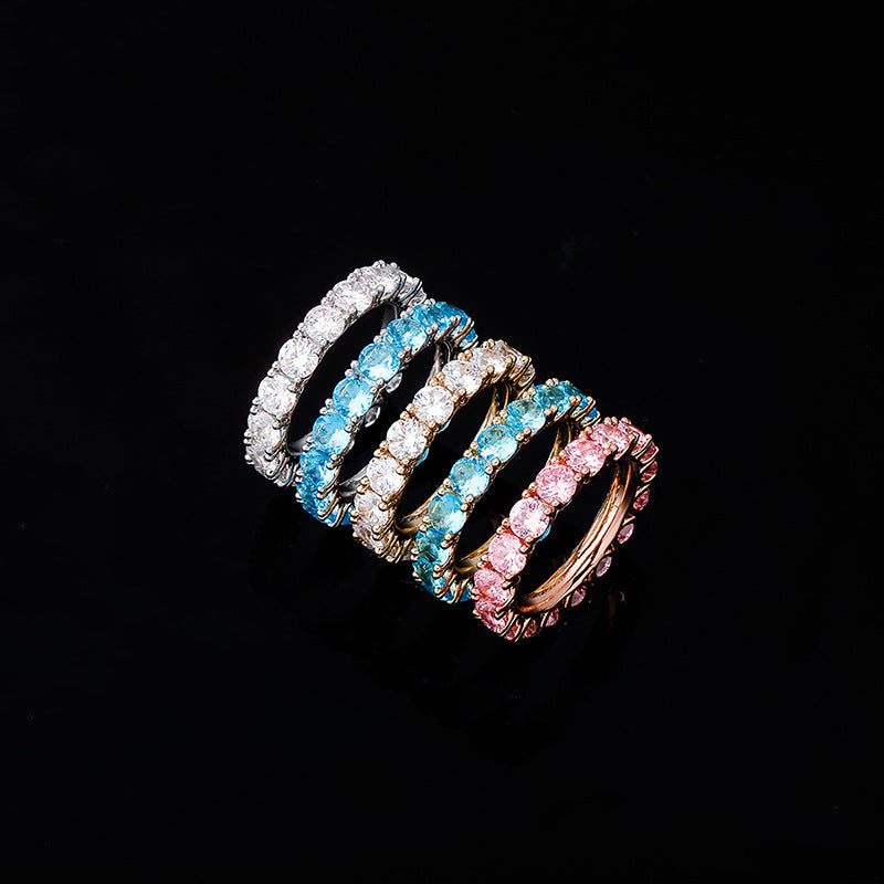 Round colored stone stacking ring inlaid with round brilliant cubic zirconias. Brass with anti-tarnish gold, silver, rose gold plating.