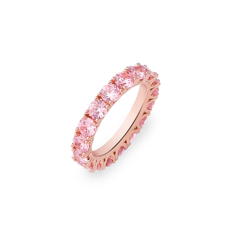 A rose gold plating brass stacking ring inlaid with pink round brilliant cubic zirconias.