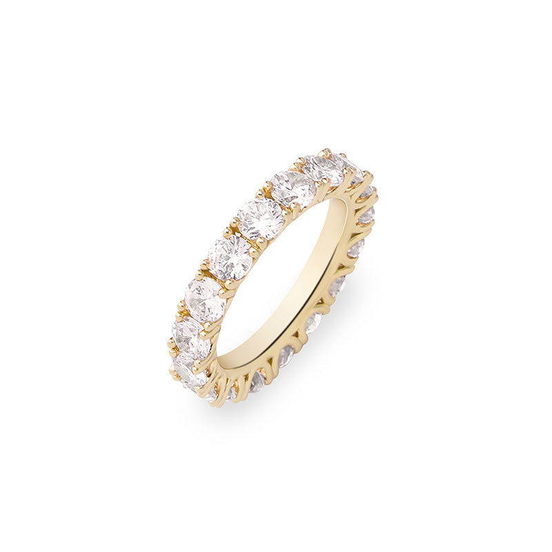 A gold plating brass stacking ring inlaid with white round brilliant cubic zirconias.