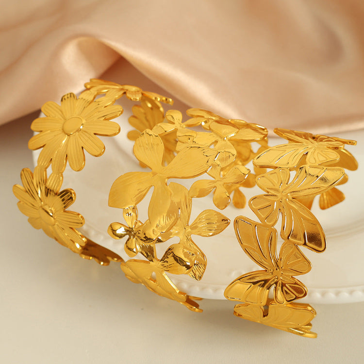 Gold plating stainless steel bangle bracelets,design in nature,flowers,butterflies,daisy