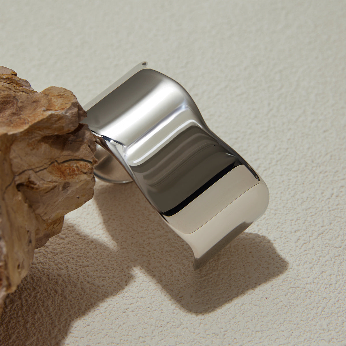 A silver plating wave design thick stainless steel bangle bracelet, high polished