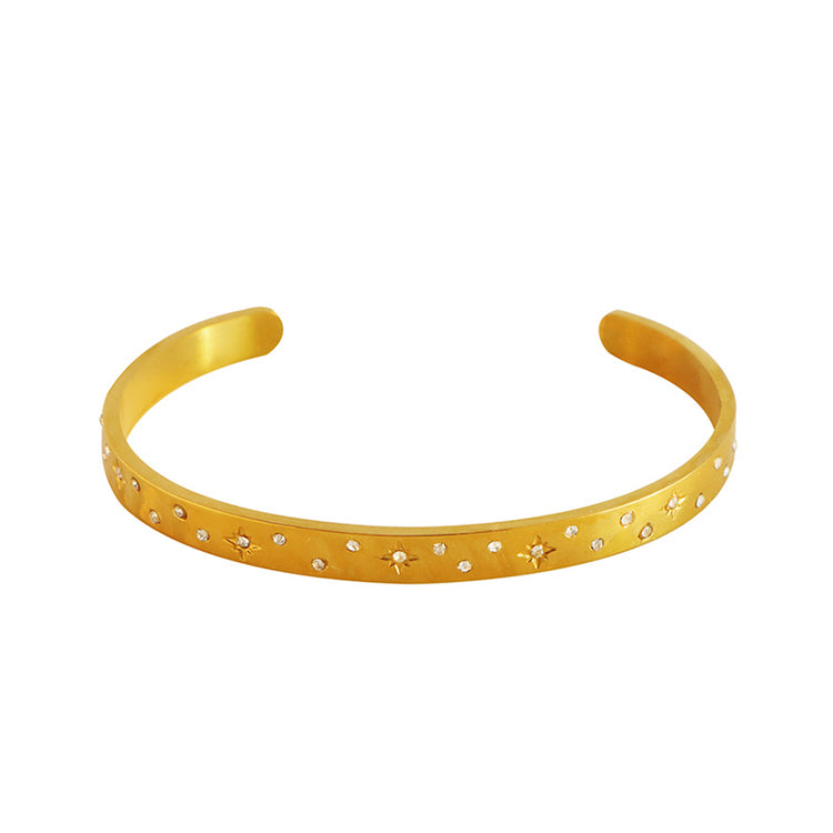 A gold plating star design with many stagger zirconias stainless steel bangle bracelet