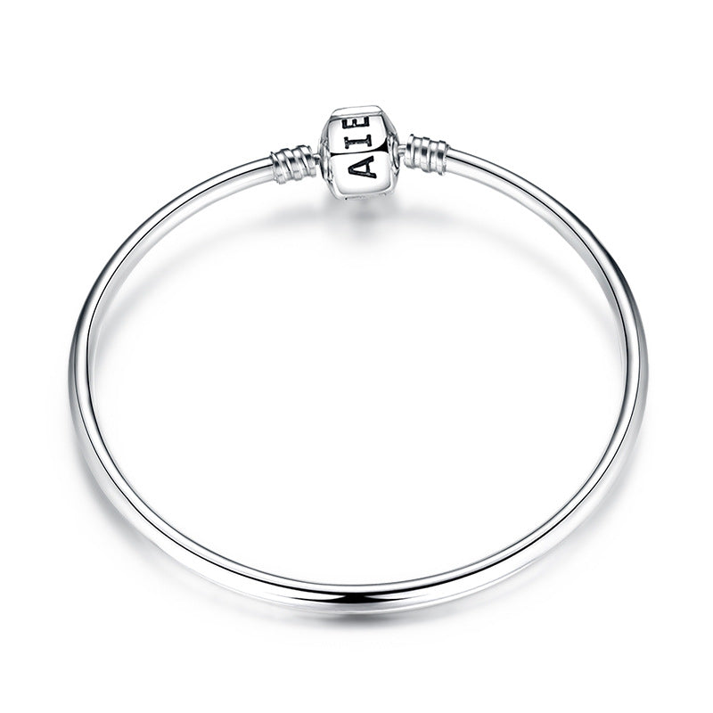A sterling silver bangle bracelet, written AIE on the box clasp.