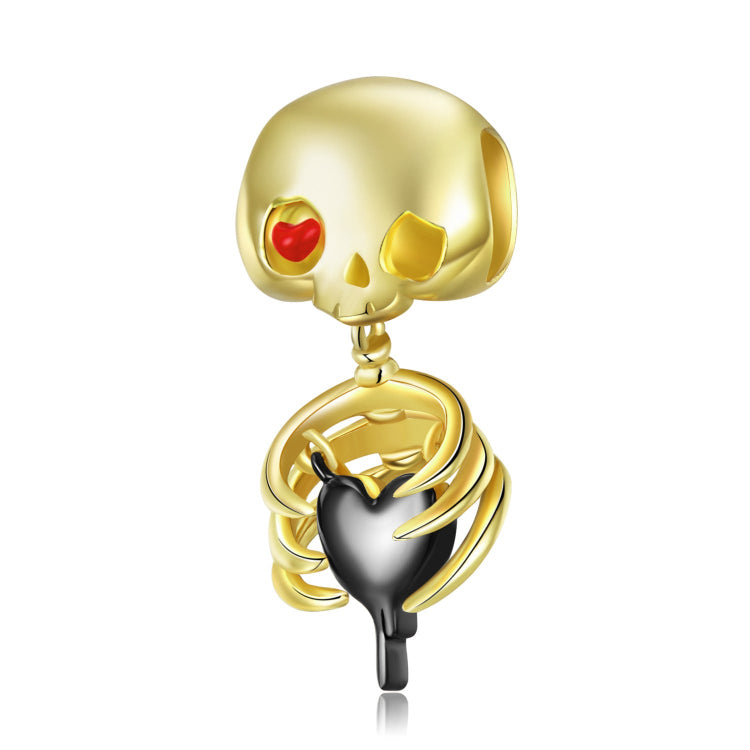 A gold plating skull with a black plating heart sterling silver charm
