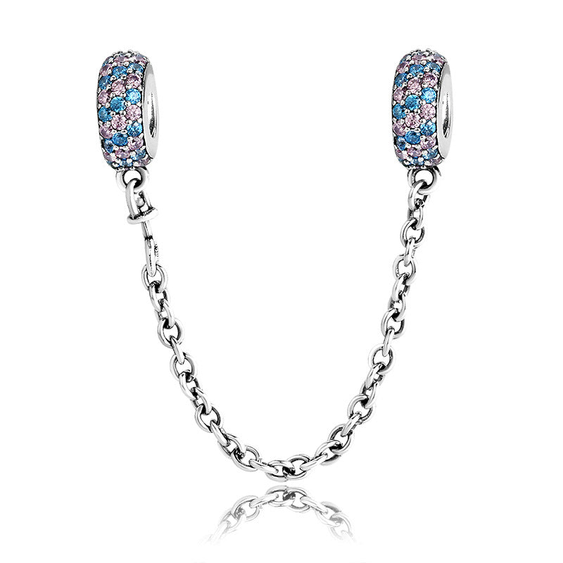 A sterling silver blue and pink zirconias paved safety chain