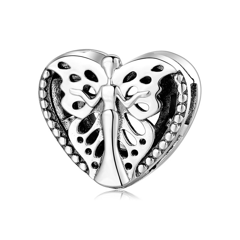 A sterling silver butterfly and angle design charm