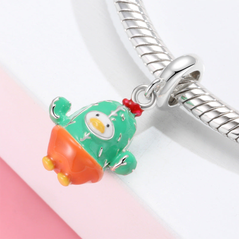 A sterling silver colorful enamel cactus duck charm
