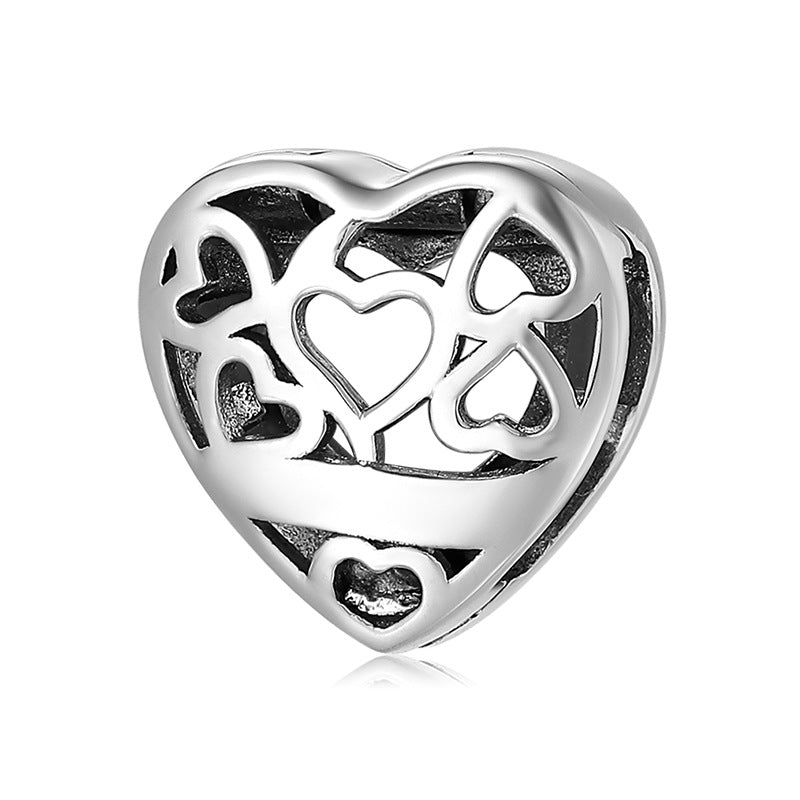 A sterling silver heart design charm