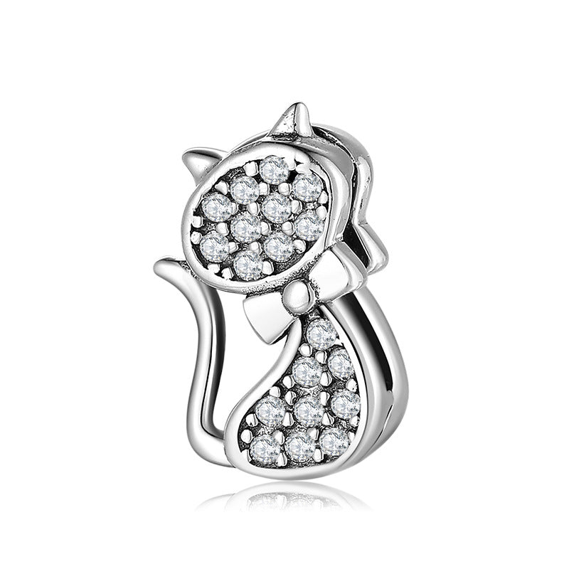A sterling silver zirconias paved cat charm