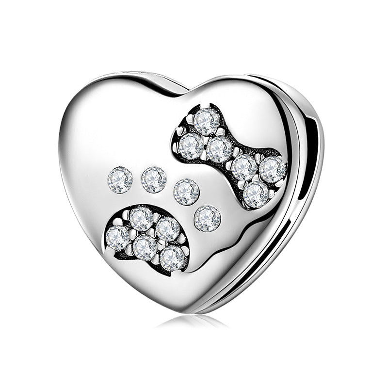 A sterling silver zirconias paved puppy design charm