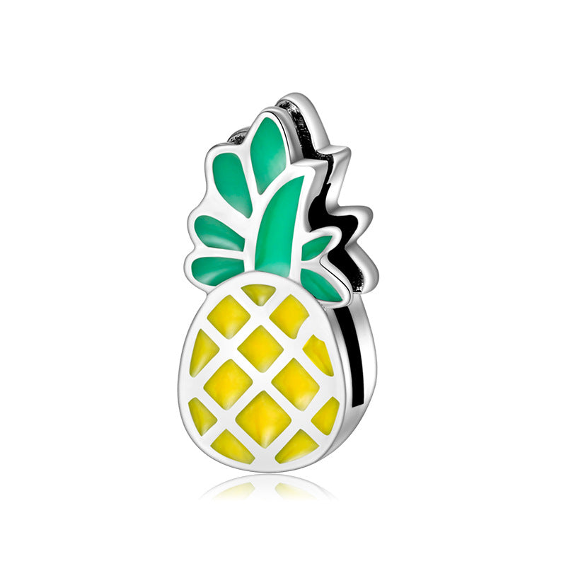 A sterling silver enamel pineapple charm