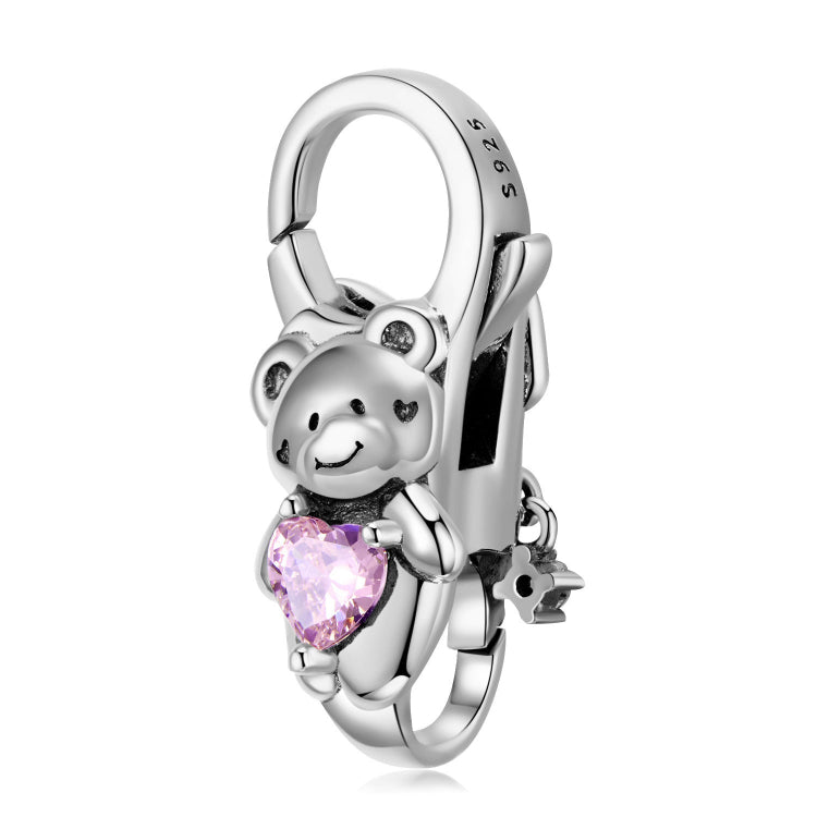 A toy bear design sterling silver lobster clasp with pink heart zirconias.
