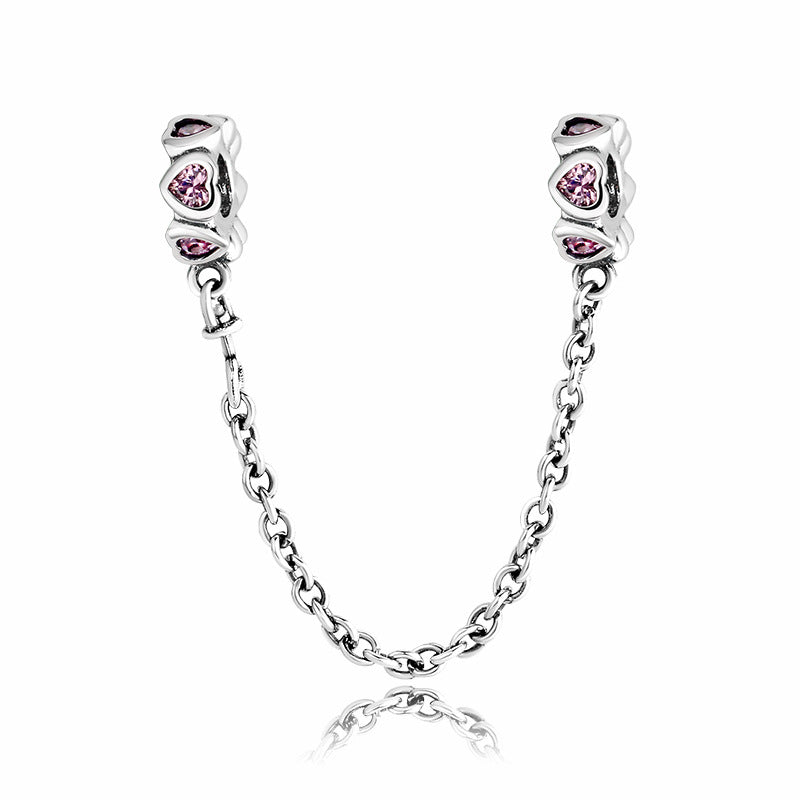 A sterling silver pink zirconias paved heart safety chain