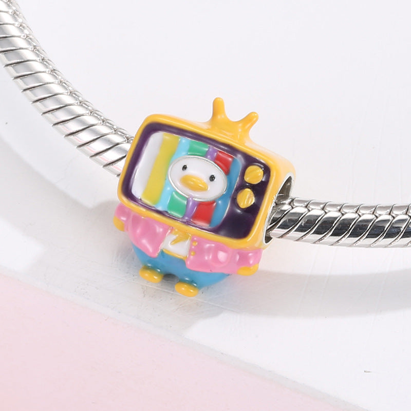 A sterling silver colorful enamel TV duck charm