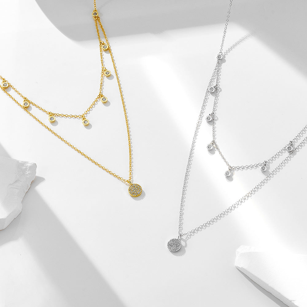 Silver plating and gold plating sterling silver zirconia layered necklaces.
