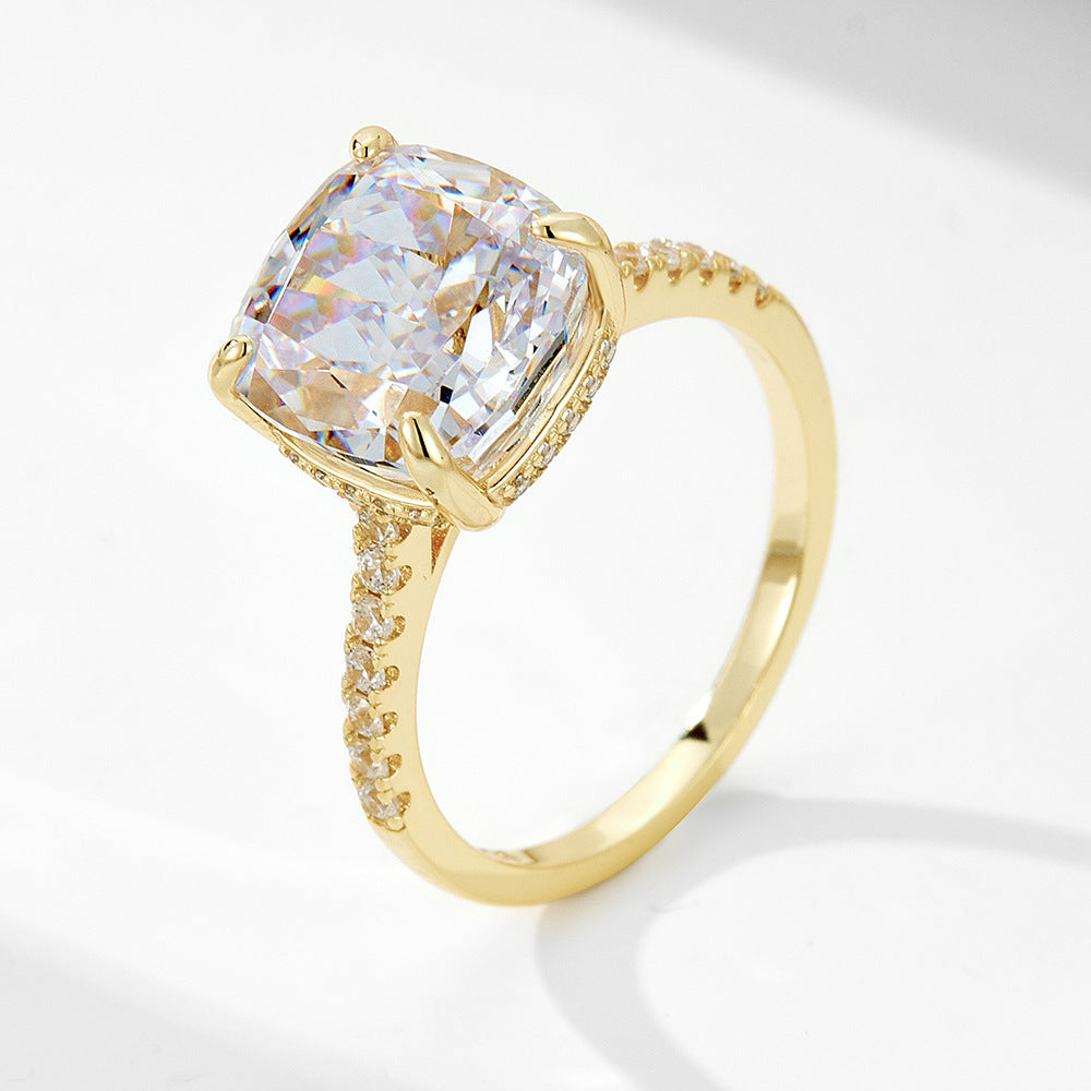 A sterling silver large center stone ring with white zirconias, primary ring of the ring set. Plating with gold.