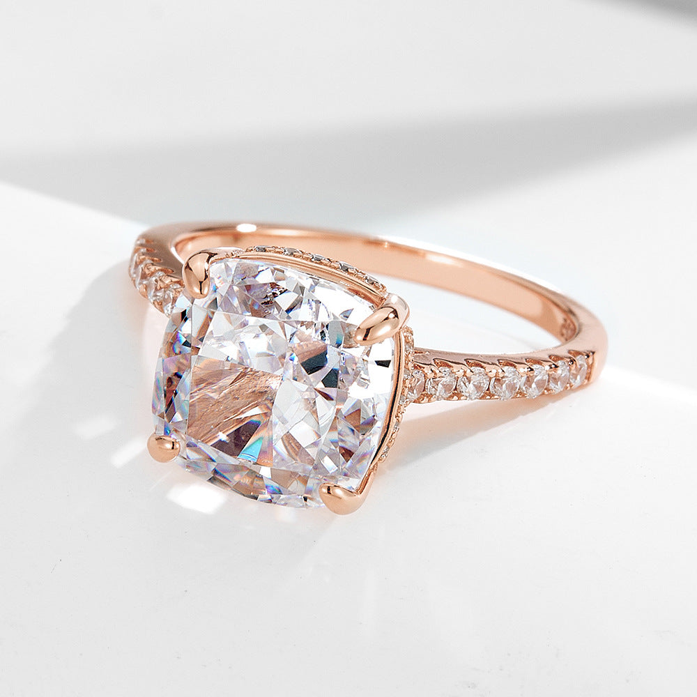 A sterling silver large center stone ring with white zirconias, primary ring of the ring set. Plating with rose gold.