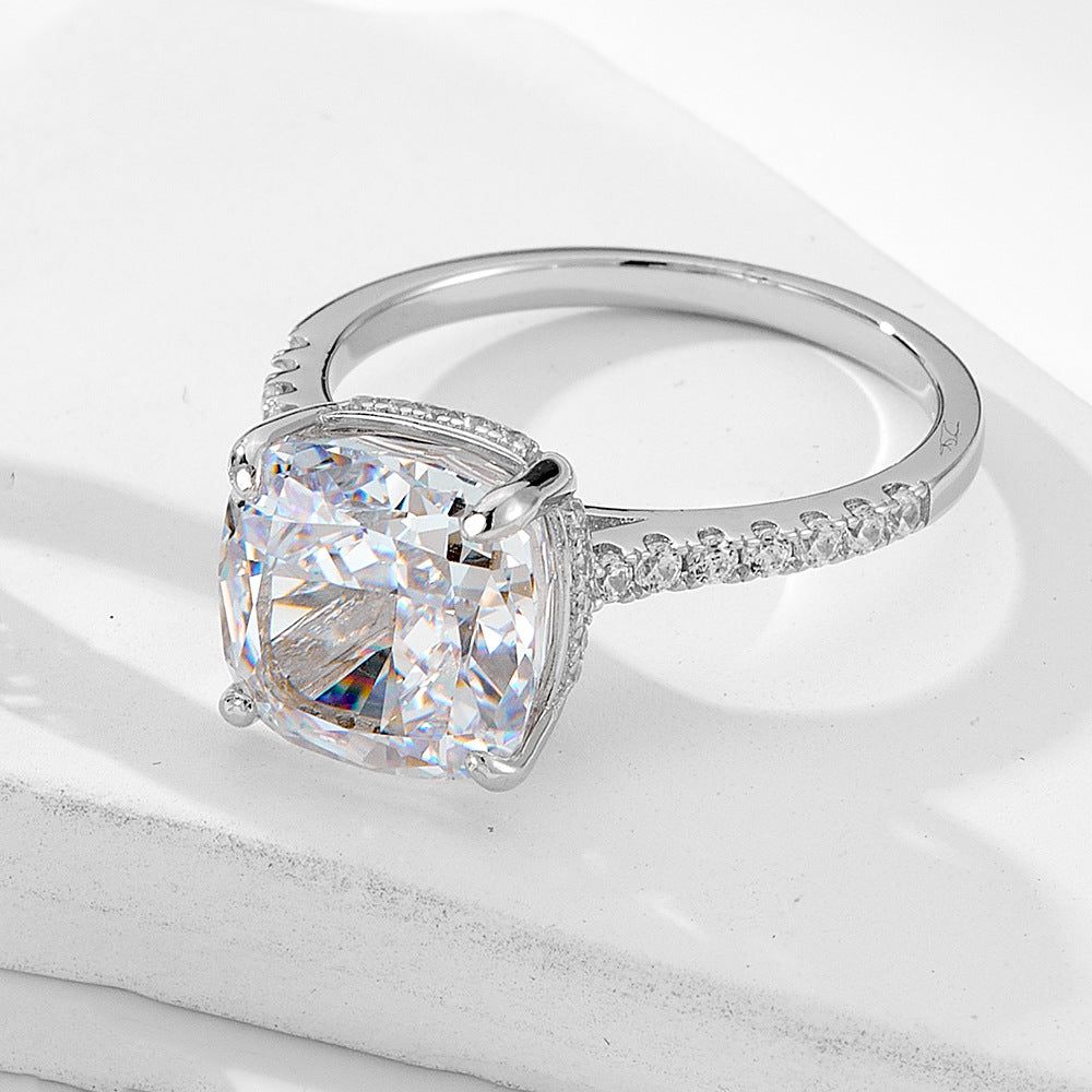 A sterling silver large center stone ring with white zirconias, primary ring of the ring set. Plating with silver.