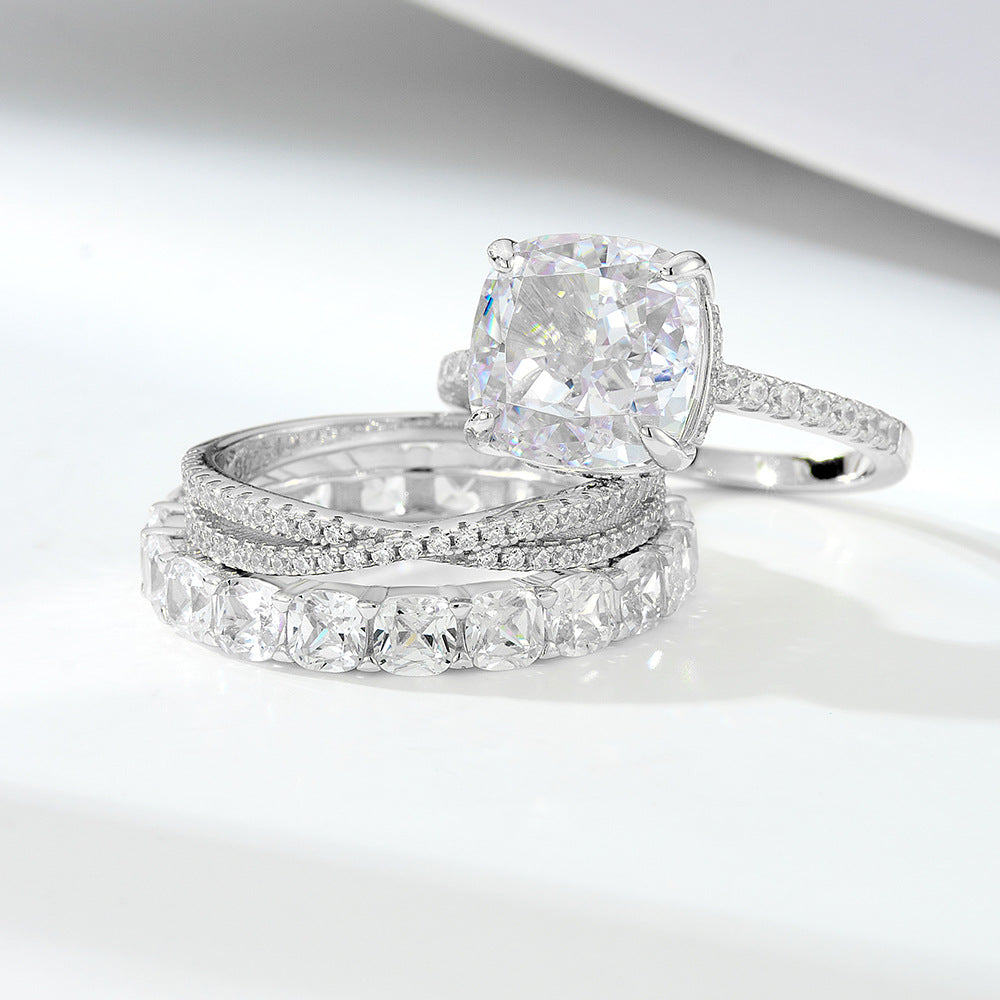 A sterling silver zirconia ring set, including one primary ring and two secondary rings, plating with silver.