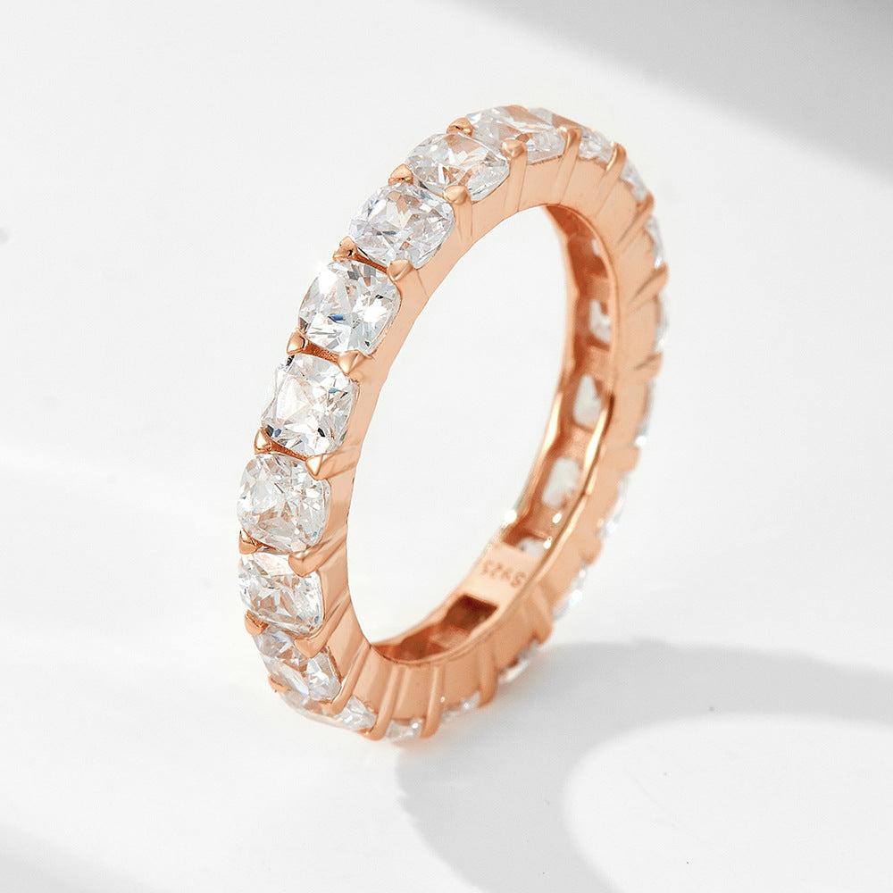A sterling silver white square zirconia band, secondary ring of the ring set. Plating with rose gold.