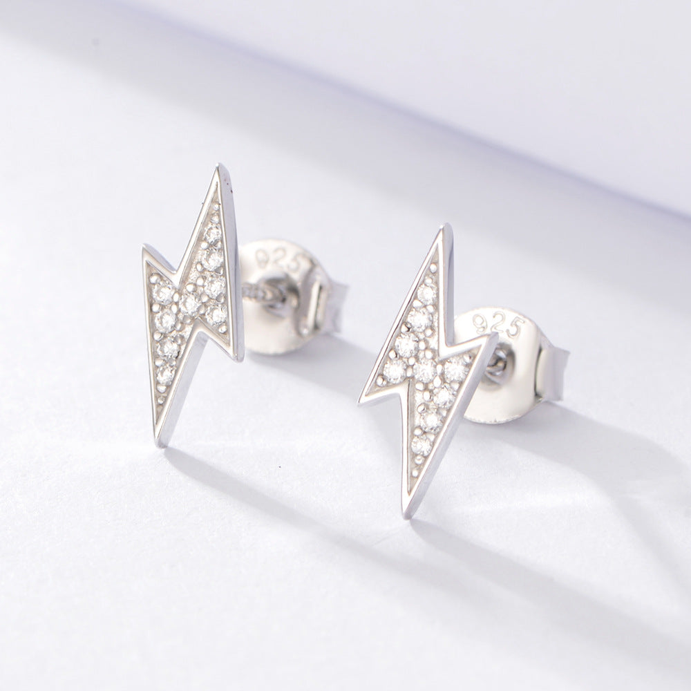 Sterling silver lightning stud earrings, inlaid with white zirconias. Plating with silver.