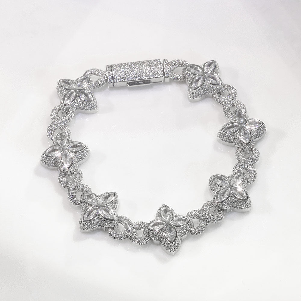 An iced out luxury big clover bracelet, infinity symbol, design in clovers with white maquise stone. Iced out box clasp. Brass with silver plating.