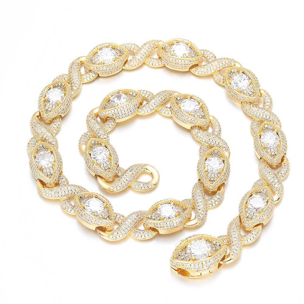 An iced out luxury evil eyes necklace, infinity symbol, evil eye design in white zirconias. Iced out box clasp. Brass with gold plating.