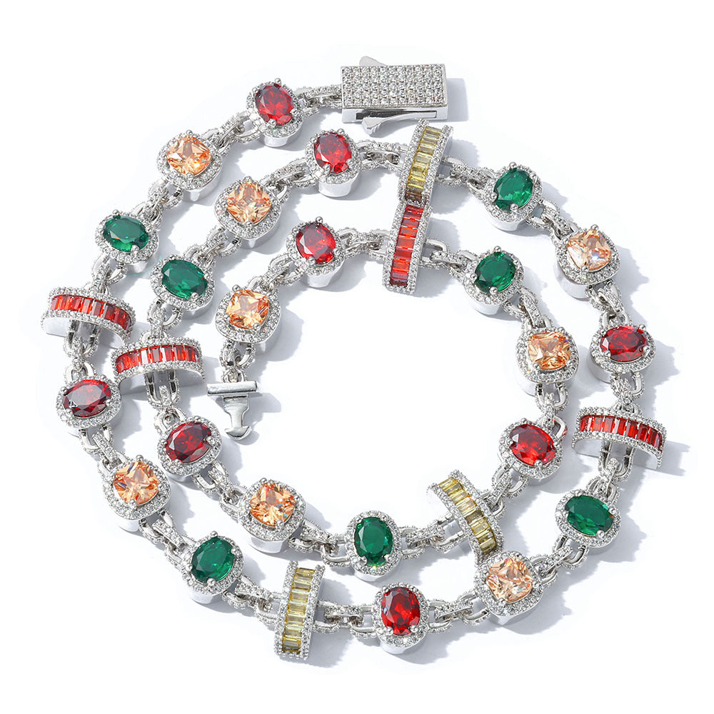 A silver plating brass necklace,  pave halo motifs, main stones in color of emerald, topaz, garnet, champagne, orange. Iced out clasp.