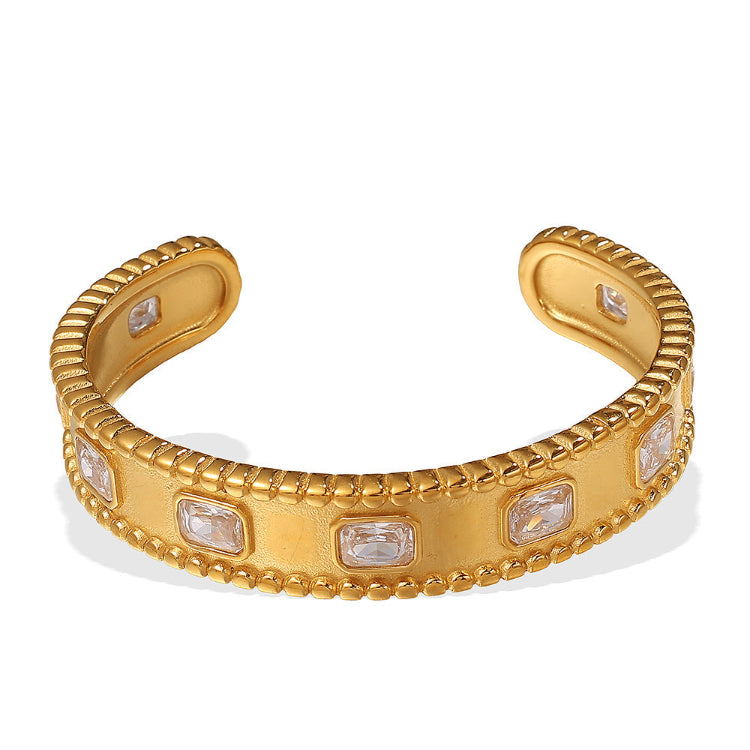 A gold plating white emeral zirconias stainless steel bangle bracelet