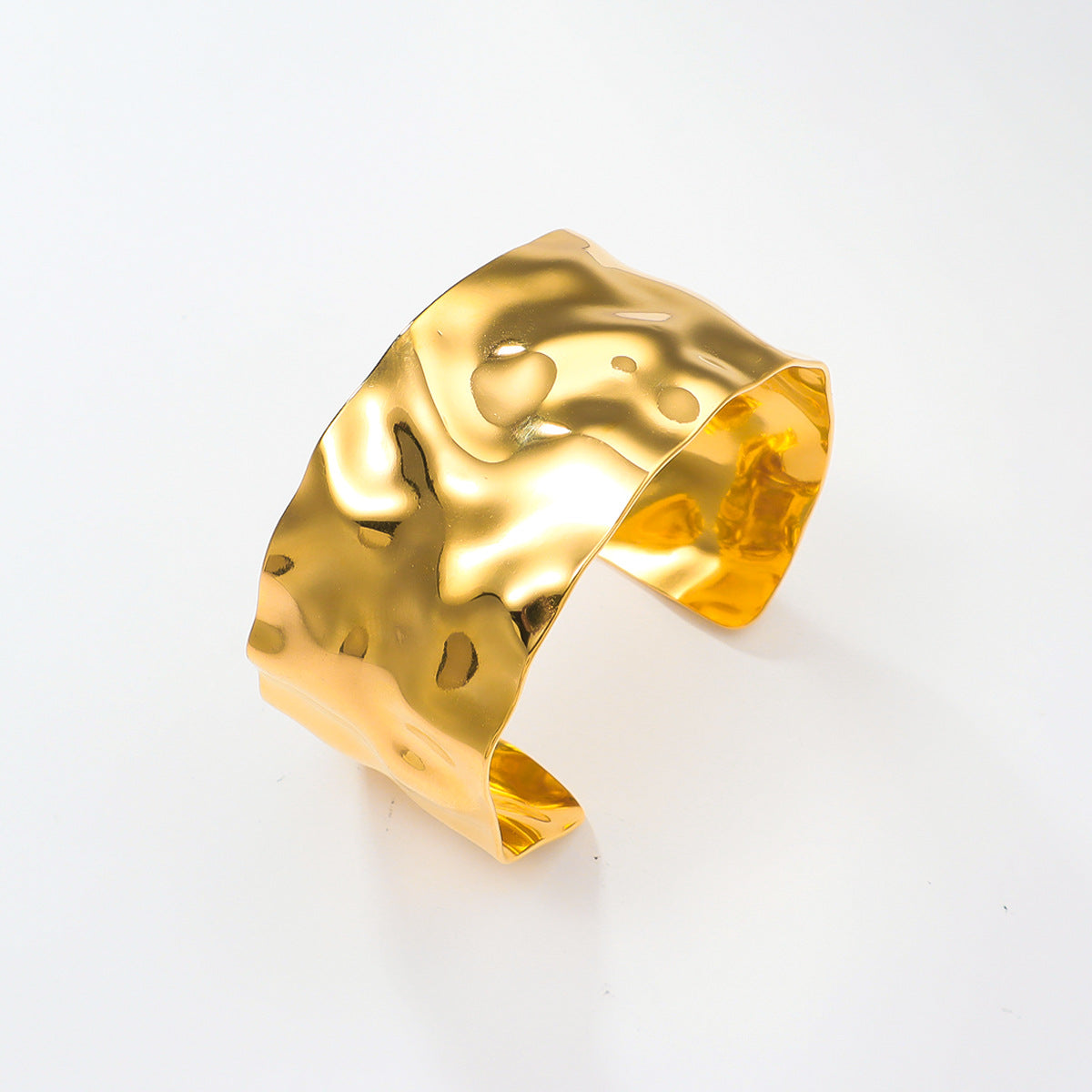 A gold plating water texture design stainless steel bangle bracelet
