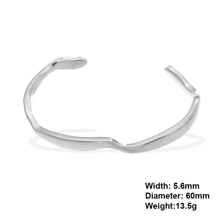 A rhodium plating wave design stainless steel bangle bracelet