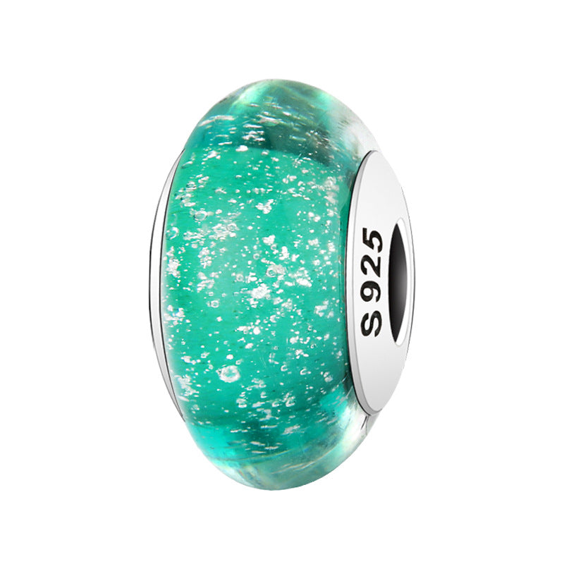 A sterling silver green sparkling glazed charm