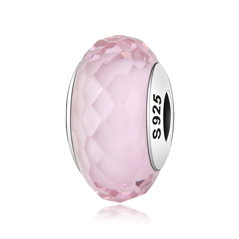 A sterling silver light pink facet glazed charm