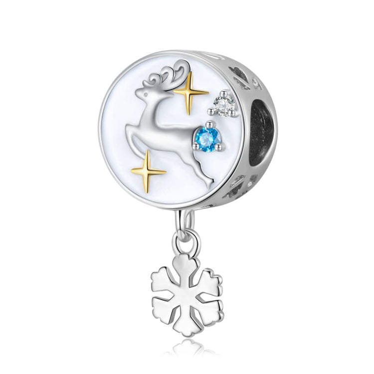 A sterling silver white enamel moose with a hanging snow flake charm