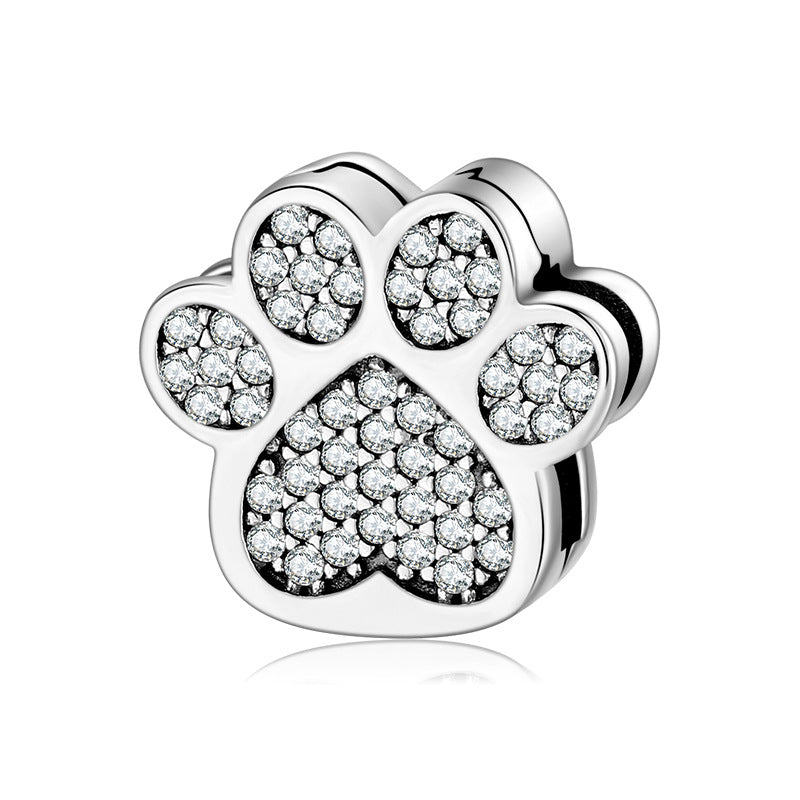 A sterling silver zirconias paved palm charm