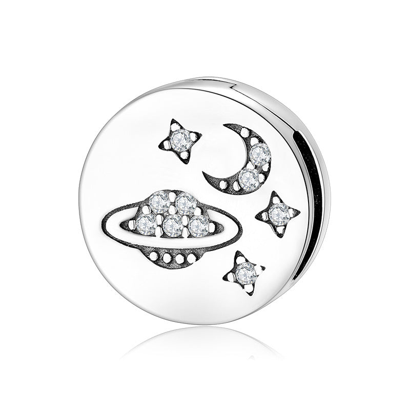 A sterling silver paved universe charm