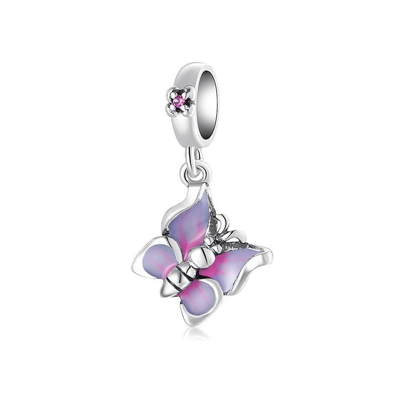 A sterling silver purple and pink enamel butterfly hanging charm