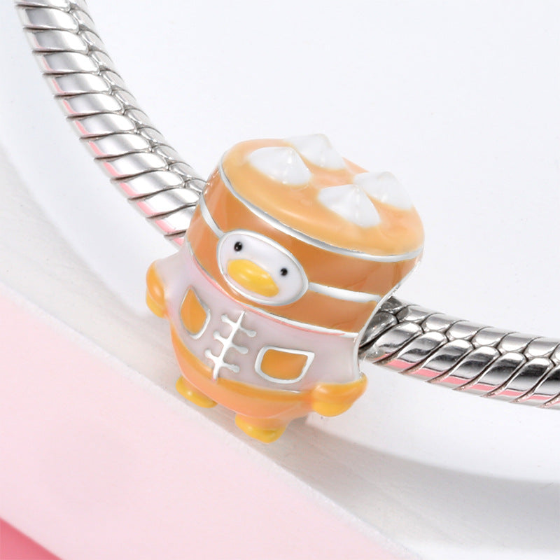 A sterling silver colorful enamel xiaolongbao duck charm